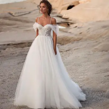 2023 Tiulio paplūdimio vestuvinės suknelės Spagečių dirželiai nuo peties Boho Vestido De Novia Nėrinių mados chalatai de Mariee
