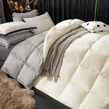 Balta žąsis žemyn Dygsniuotas guodėjas Kietas sutirštintas Žieminė antklodė Karalius Karalienė Pilna antklodėms Lovatiesė ant lovos Antklodės pledas
